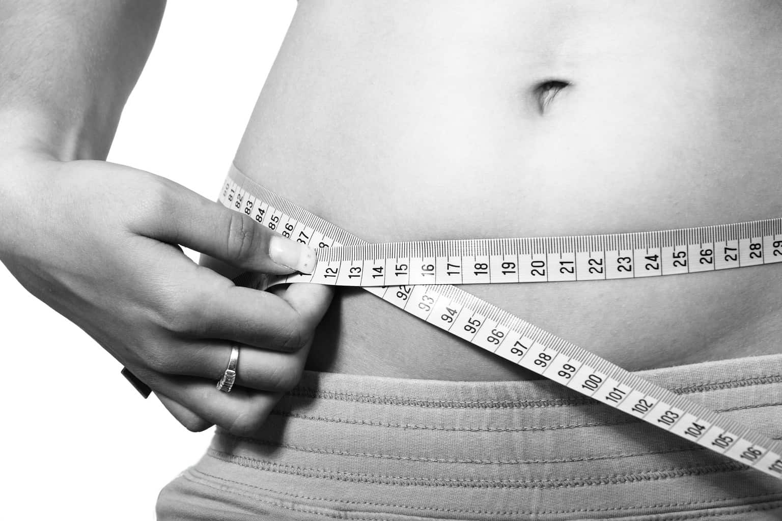 image of a measuring tape and belly