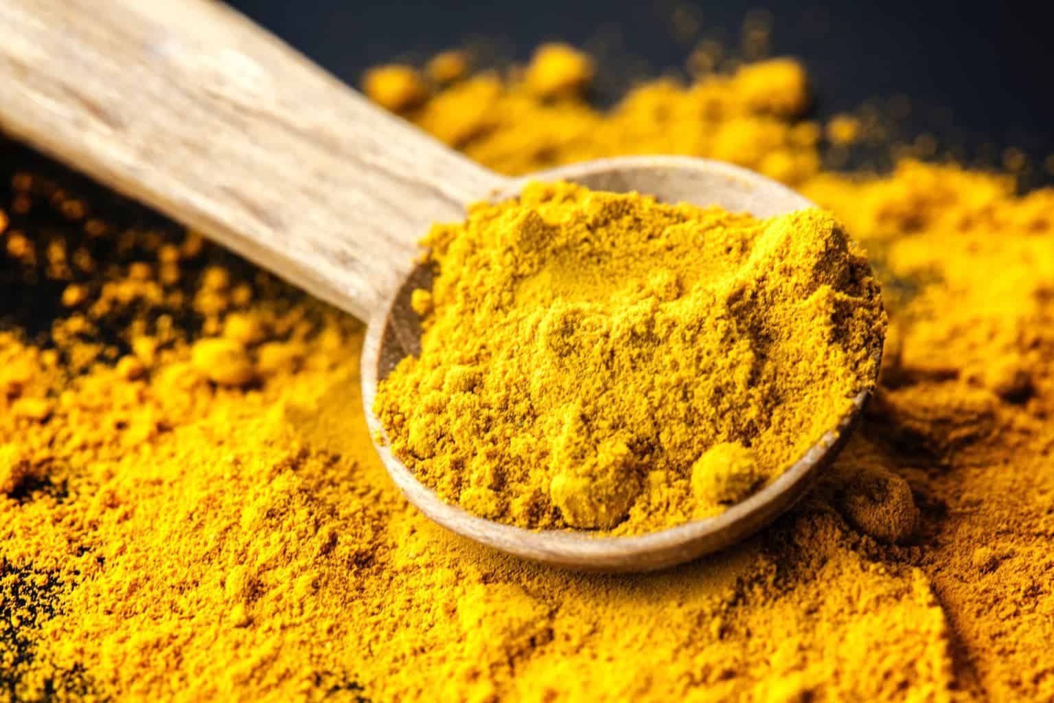 turmeric powder on spoon