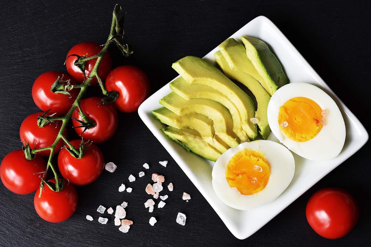 eggs avocadoes and cherry tomatoes