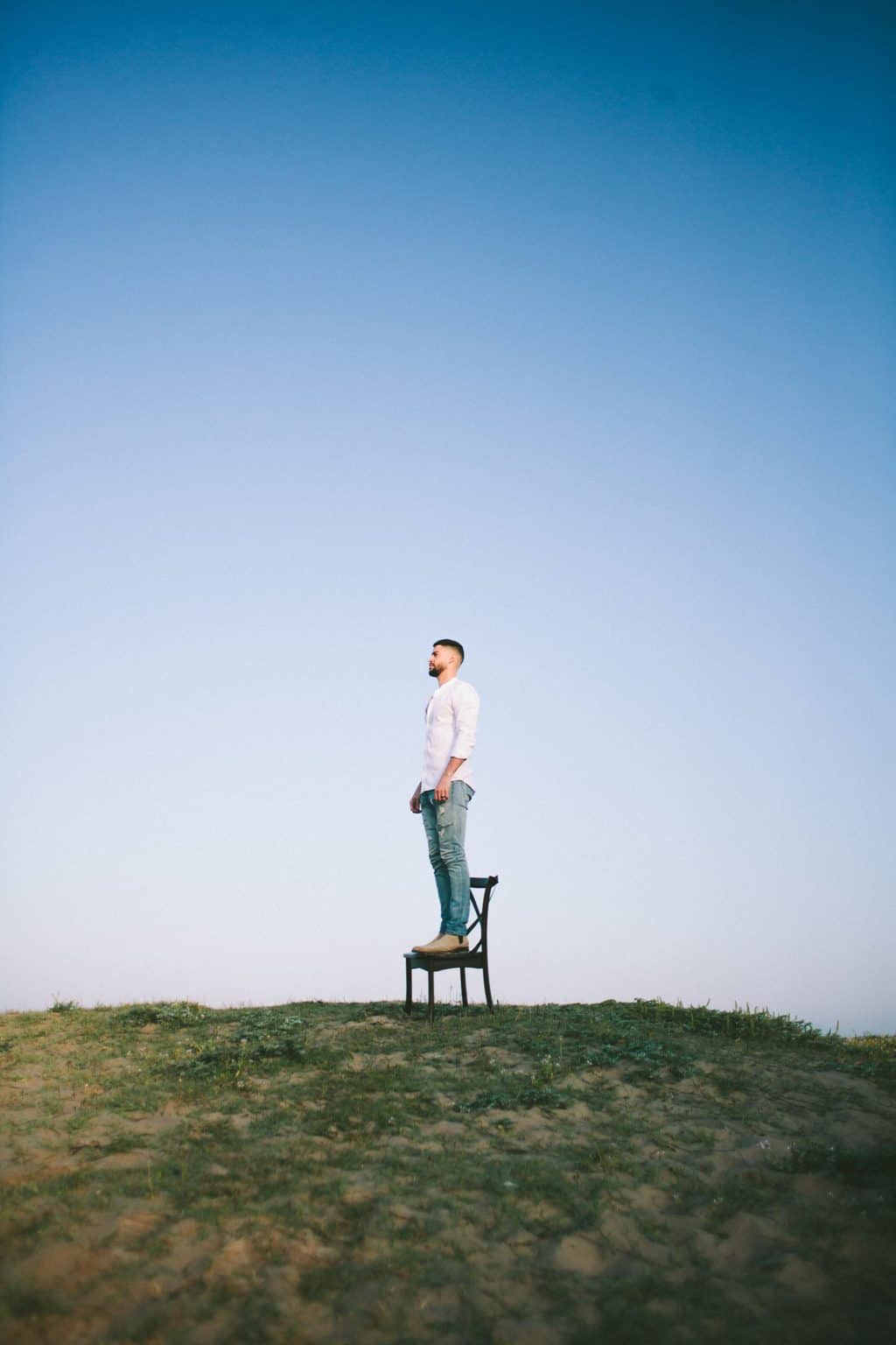 man standing on a chair